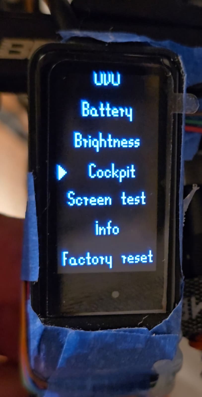 SW102 settings menu with the selection marker